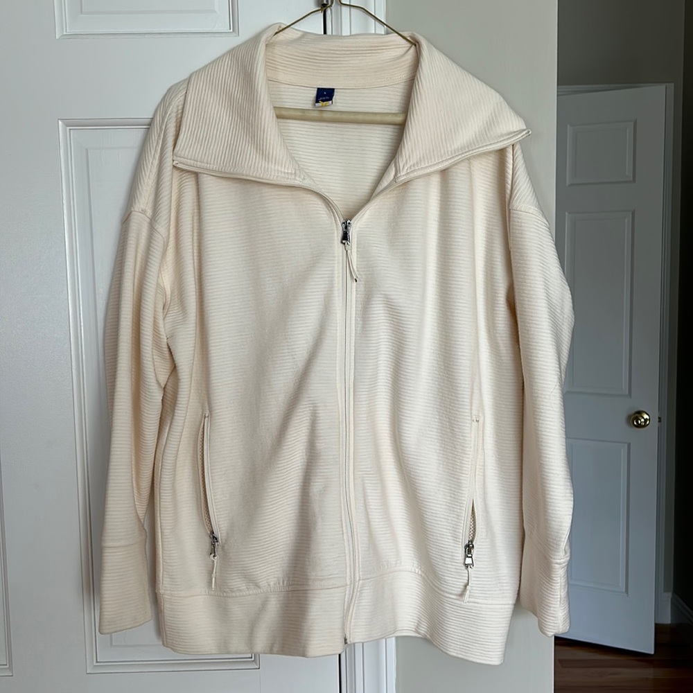 White zip up jacket